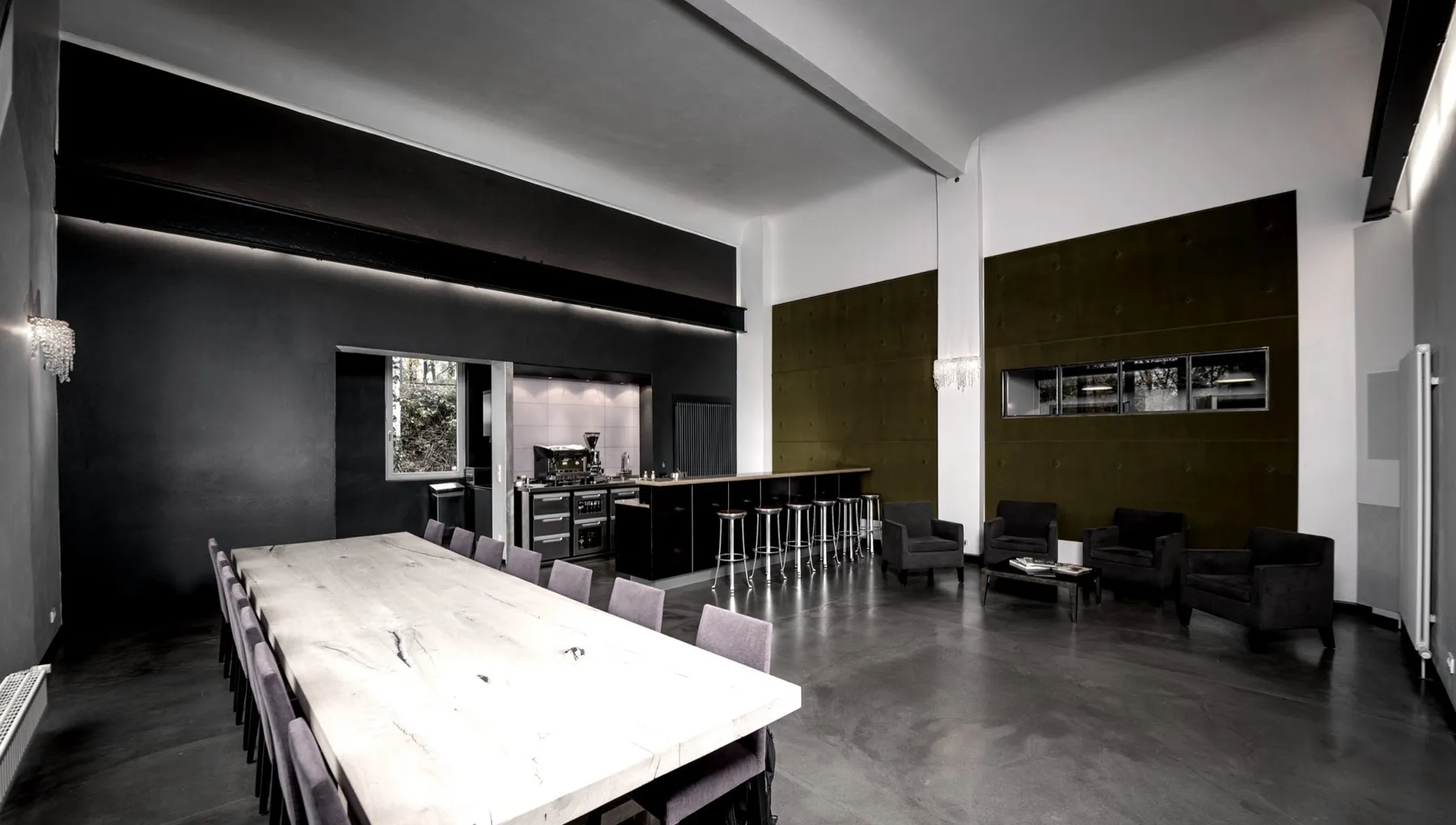 The J.O.D Artists hall in Hamburg: long table, bar and lounge, used for dinners, parties and video shoots